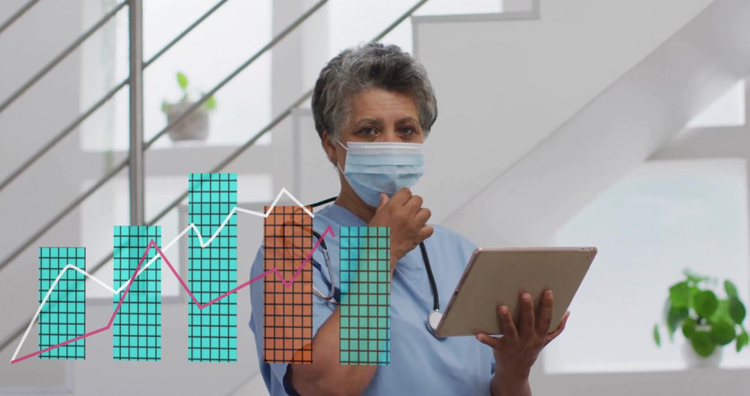 Nurse Examining Data on Tablet in Sterile Clinic Environment