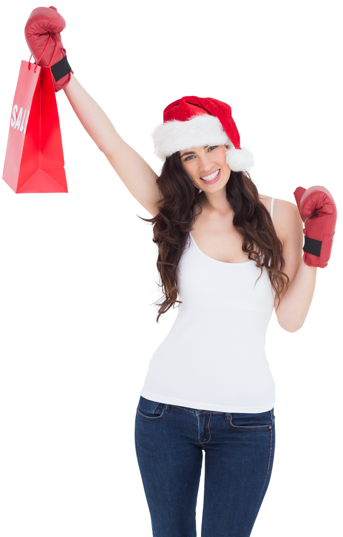 Excited Woman in Santa Hat and Boxing Gloves Holding Red Sale Bag on Transparent Background - Download Free Stock Images Pikwizard.com