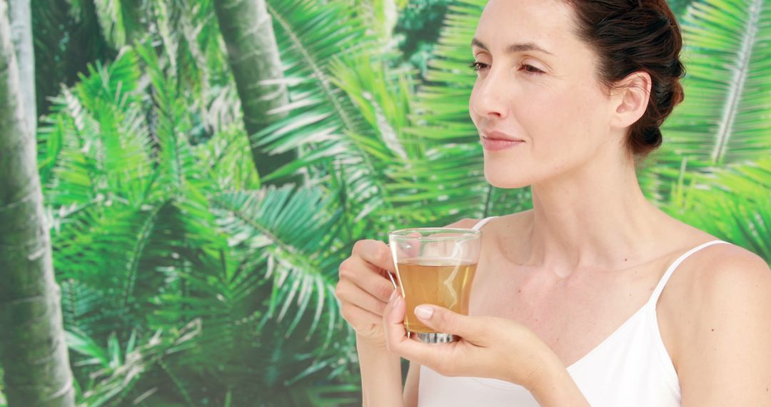 Woman Enjoying Coffee in Tropical Environment - Free Images, Stock Photos and Pictures on Pikwizard.com