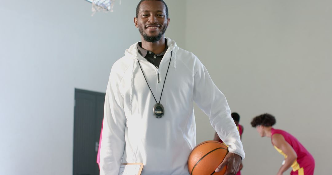 Basketball Coach Leading Team with Strategy and Skills