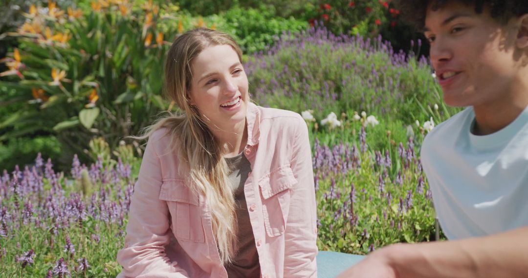 Happy Couple Relaxing in Lush Garden