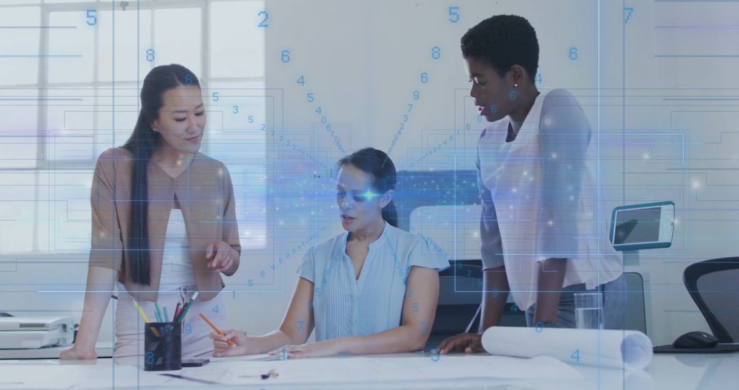 Colleagues Collaborating Over Design Plans in Modern Office