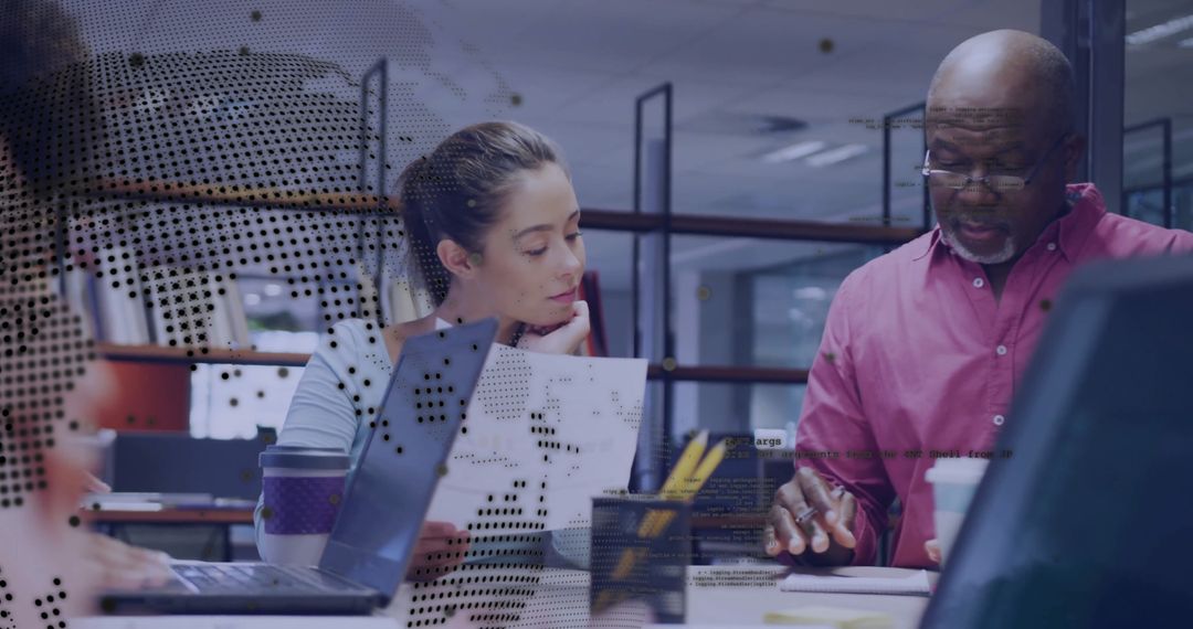 Diverse Professionals Collaborating in Open-Plan Office Environment