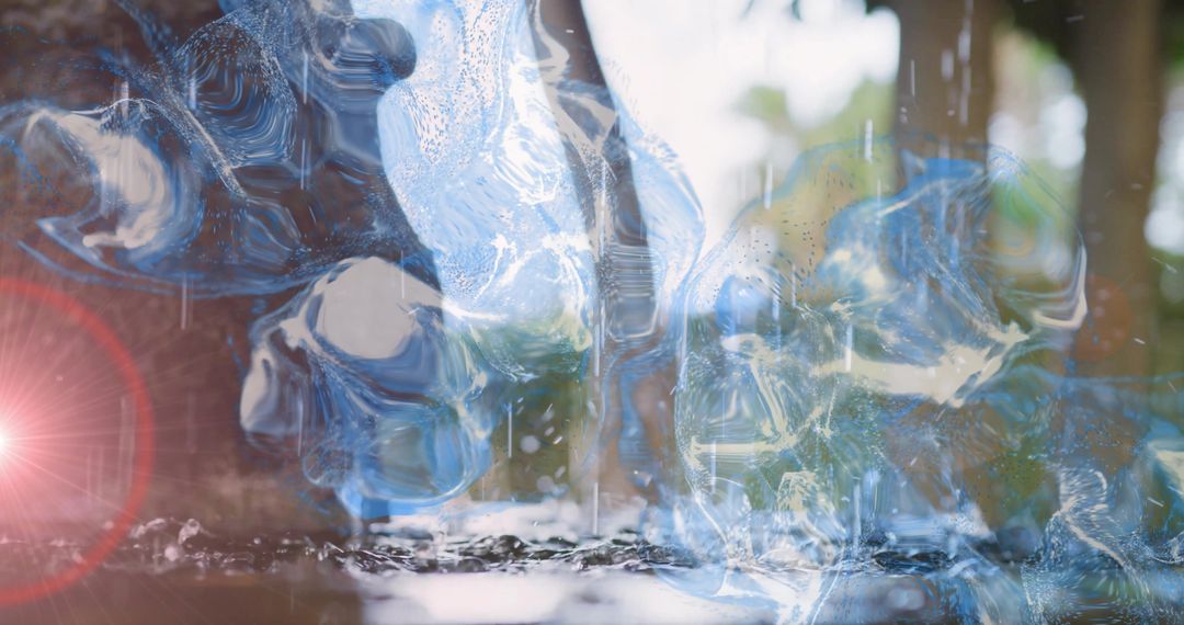 Glassy Blue Water Swirls Reflecting Woodland Bokeh and Sun Flare over Shallow Pool