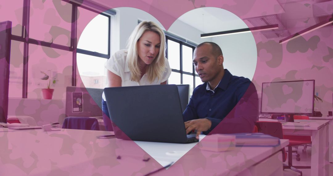Coworkers Collaborating with Heart Overlay at Workplace