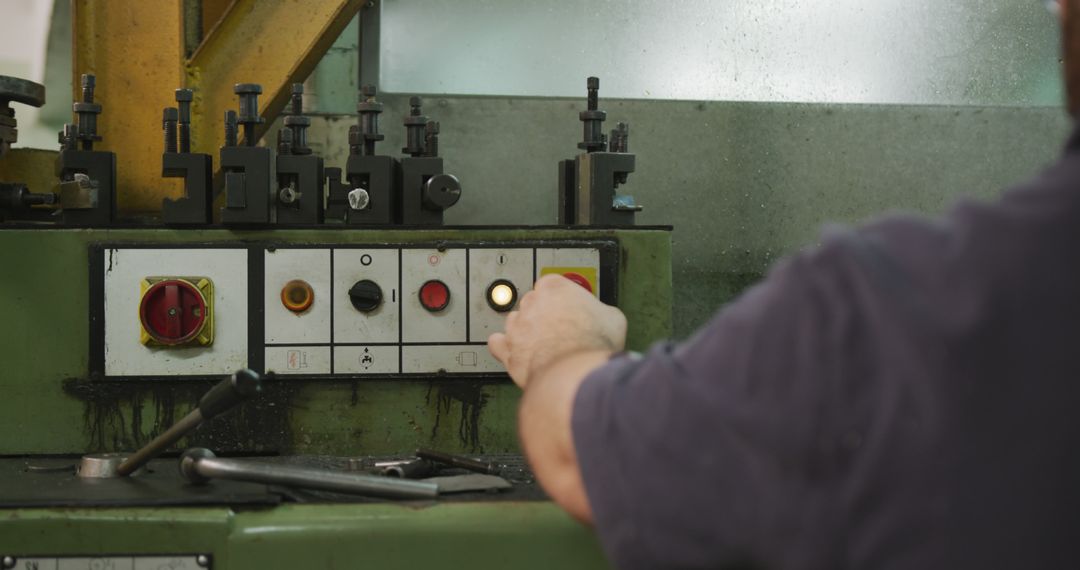 Worker Operating Industrial Machine Control Panel in Factory - Free Images, Stock Photos and Pictures on Pikwizard.com