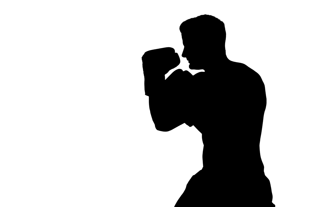 Side View of Strong Boxer Practicing Punch with Transparent Gloves