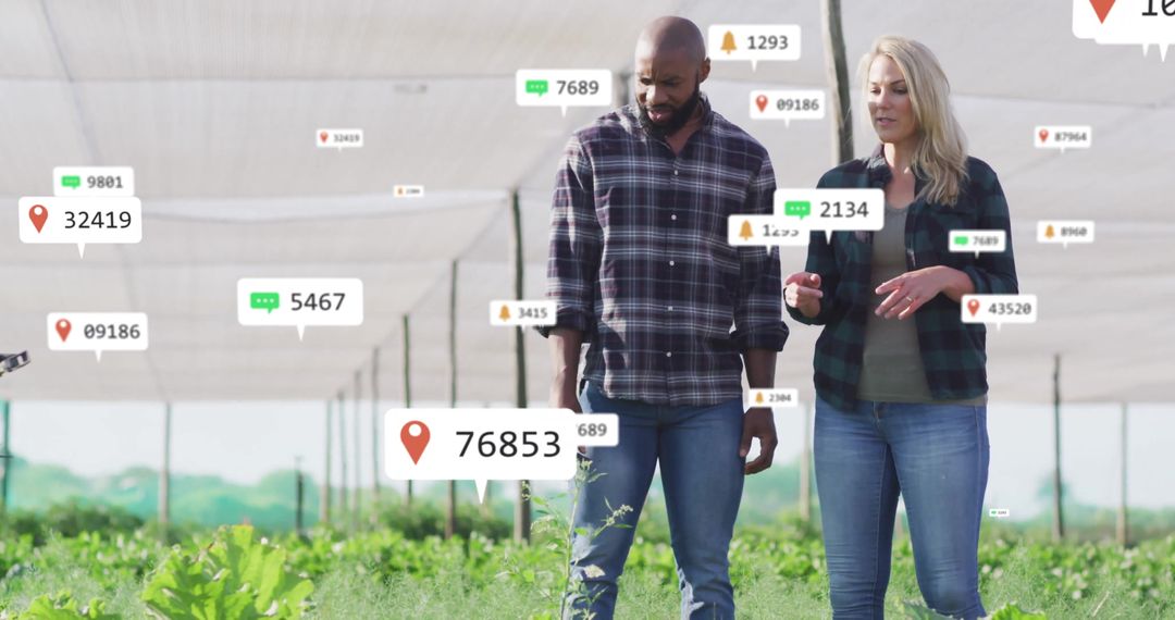 Agricultural Specialists Analyzing Data in Eco-Friendly Setting