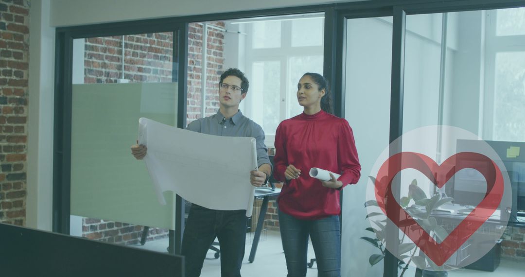 Colleagues Discussing Blueprints in Modern Office Space