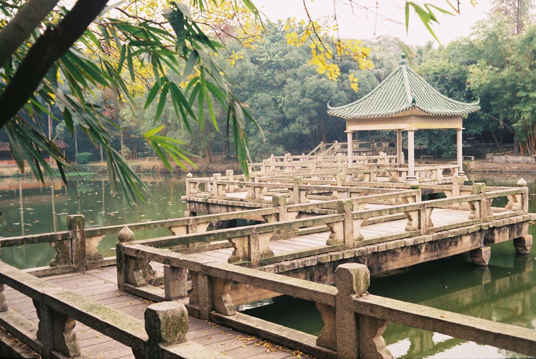 Serene Asian Pavilion Overlooking Tranquil Pond - Free Images, Stock Photos and Pictures on Pikwizard.com