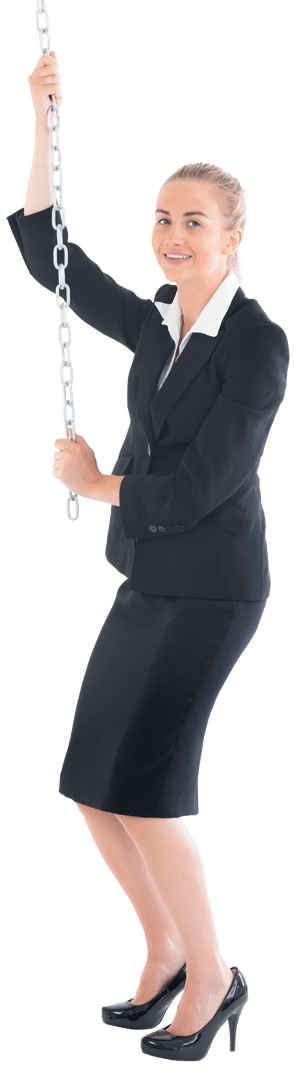 Smiling Businesswoman in Suit Pulling Transparent Chain for Success
