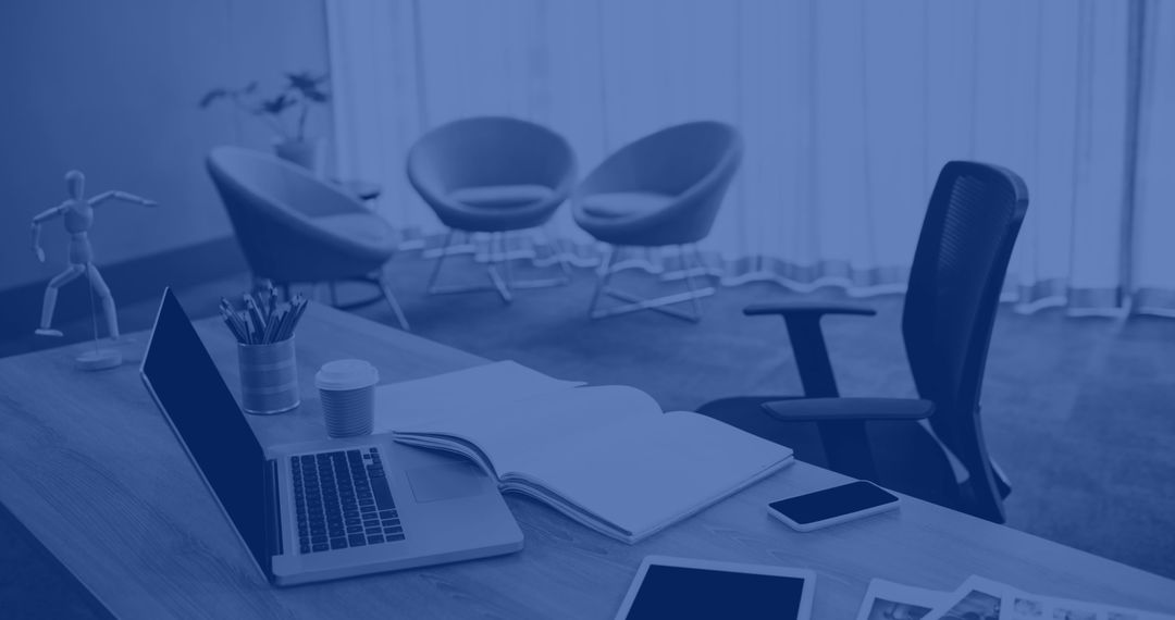 Modern Office Workspace with Open Laptop