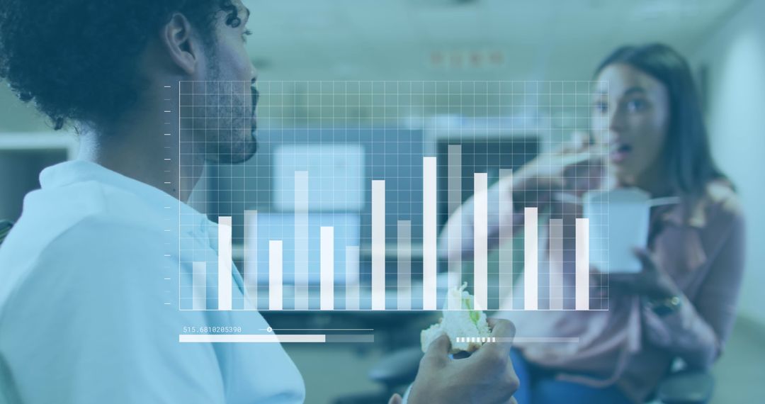 Colleagues Analyzing Data During Office Lunch Break