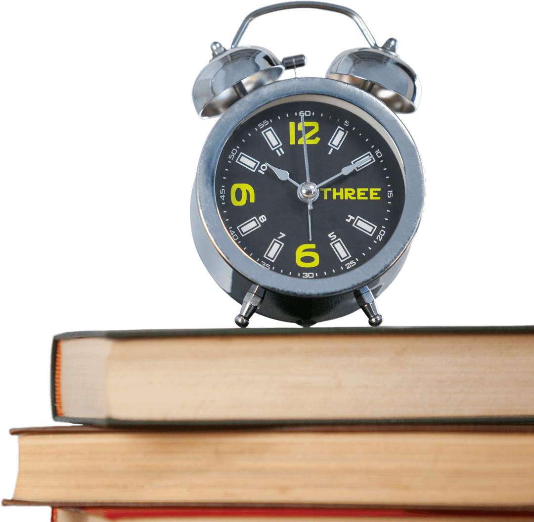 Transparent Alarm Clock on Stack of Books for Time Management Theme