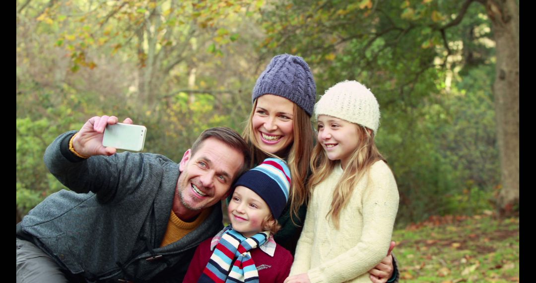 Happy Family Taking Selfie in Autumn Park - Free Images, Stock Photos and Pictures on Pikwizard.com