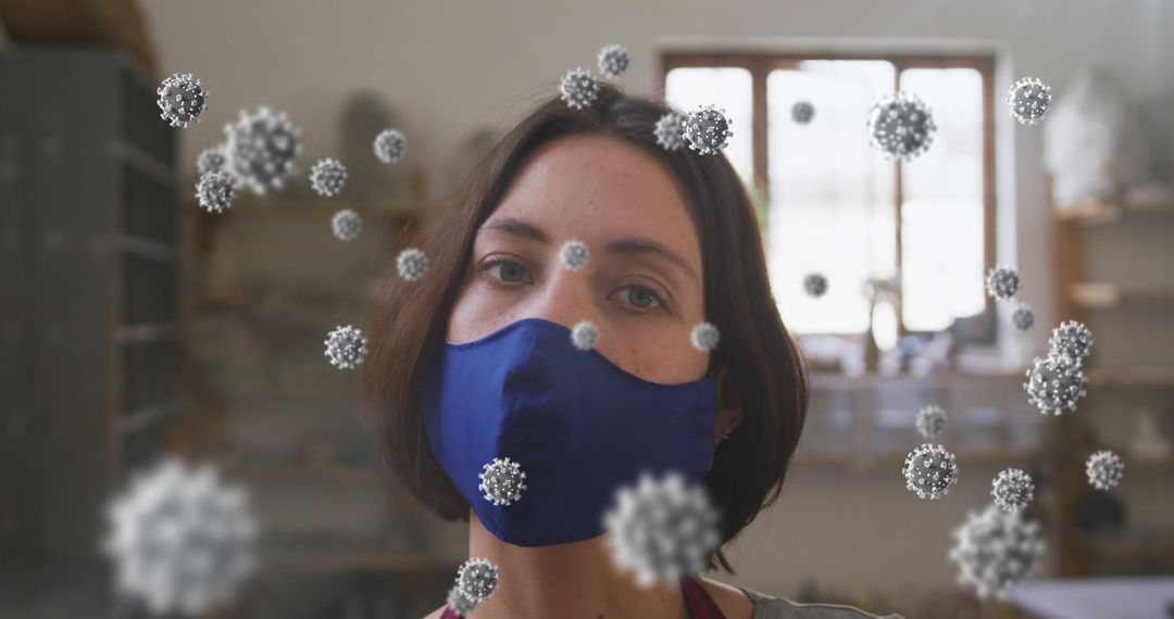 Woman Wearing Mask in Pottery Studio with Floating COVID-19 Cells