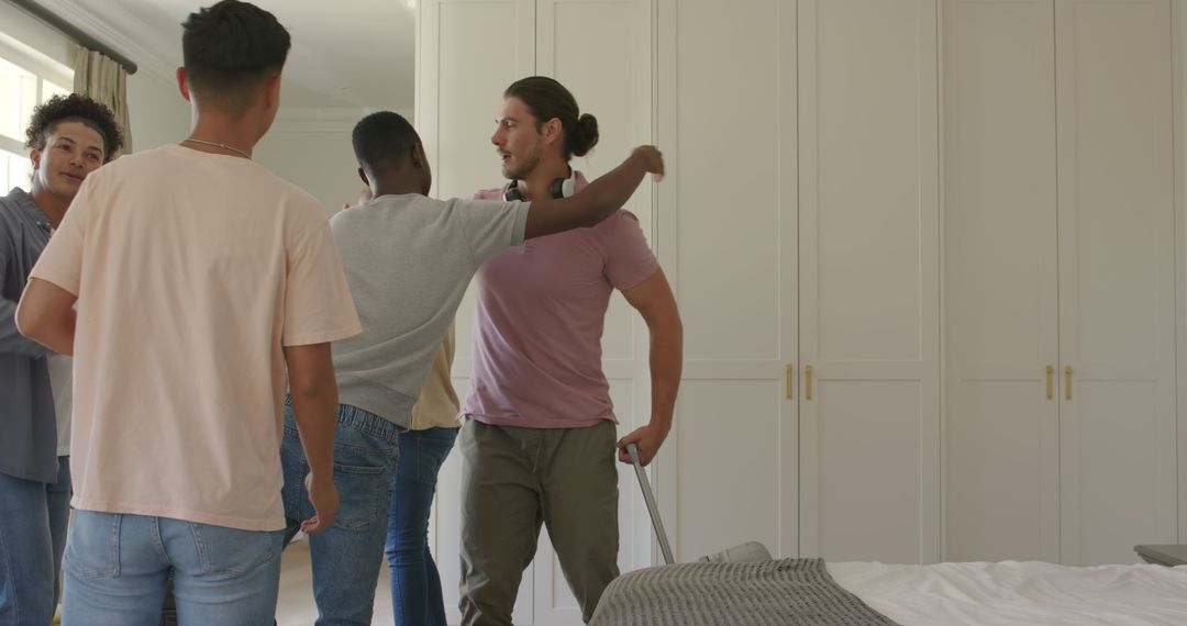Friends Embracing with Excitement While Packing for Trip