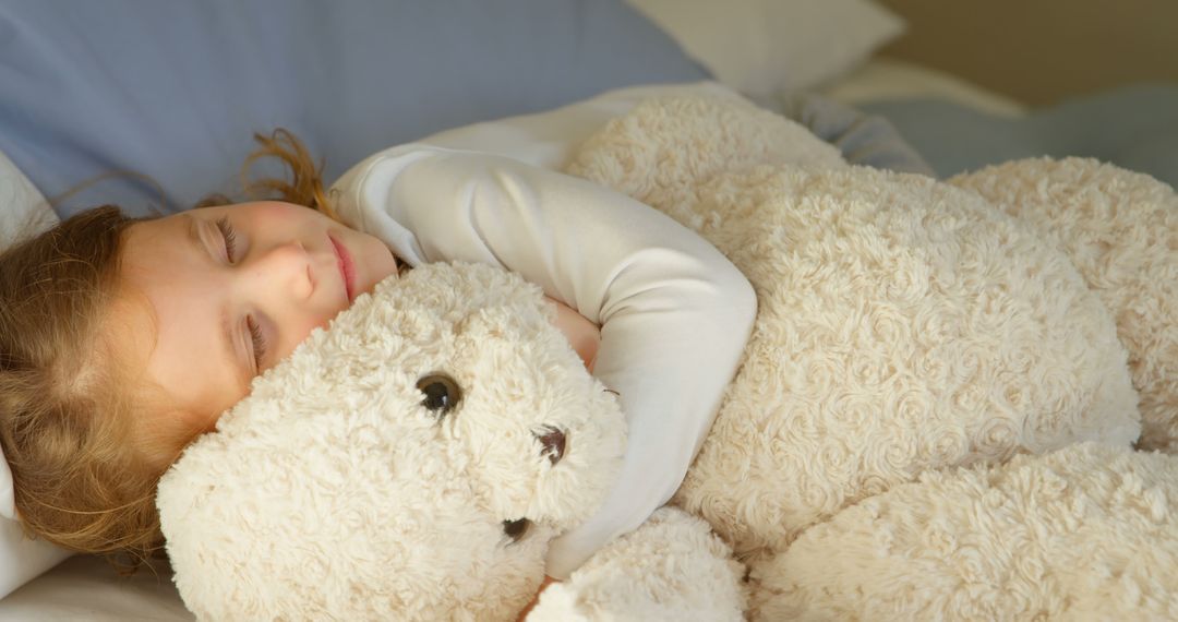 Happy Child Hugging Teddy Bear During Sleep - Free Images, Stock Photos and Pictures on Pikwizard.com