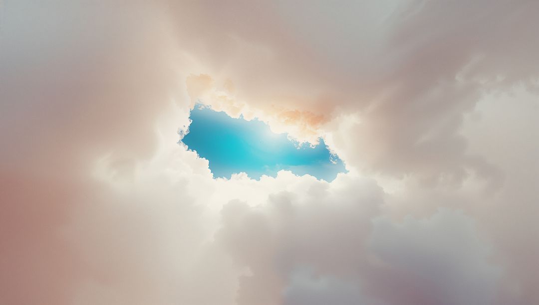 Sky Opening Through Cumulus Clouds with Soft Hues