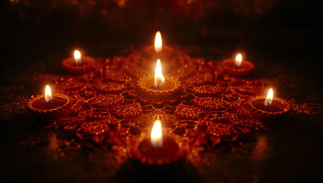 Festive Arrangement of Lit Earthen Lamps on Patterns
