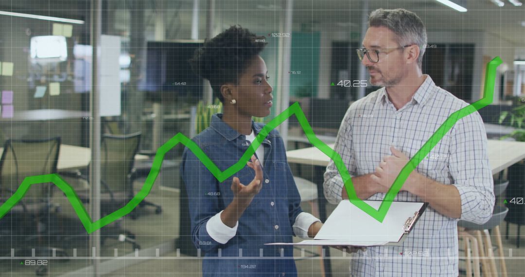 Colleagues Discussing Data with Graph Overlay in Modern Office