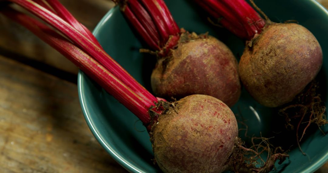 Freshly Harvested Organic Beetroots in Blue Bowl - Free Images, Stock Photos and Pictures on Pikwizard.com