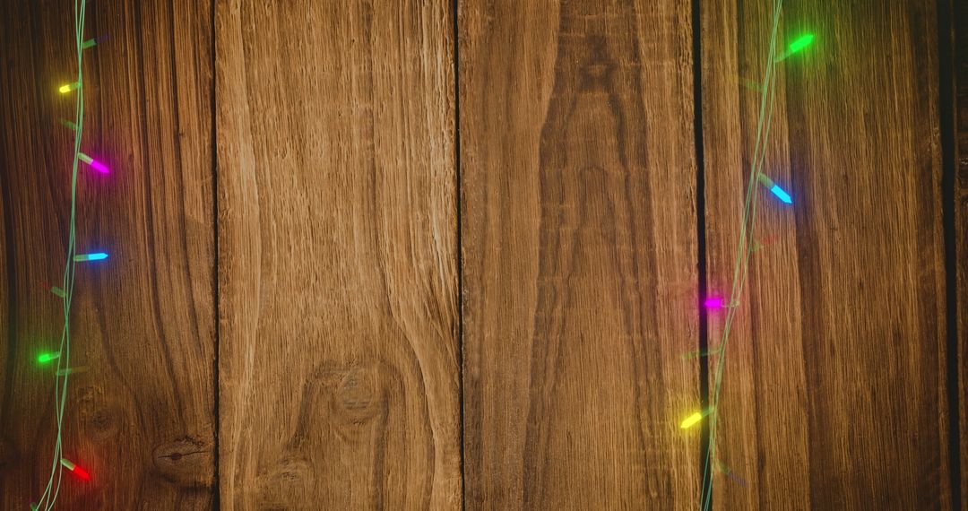 Wooden Background with Christmas Fairy Lights Display - Free Images, Stock Photos and Pictures on Pikwizard.com