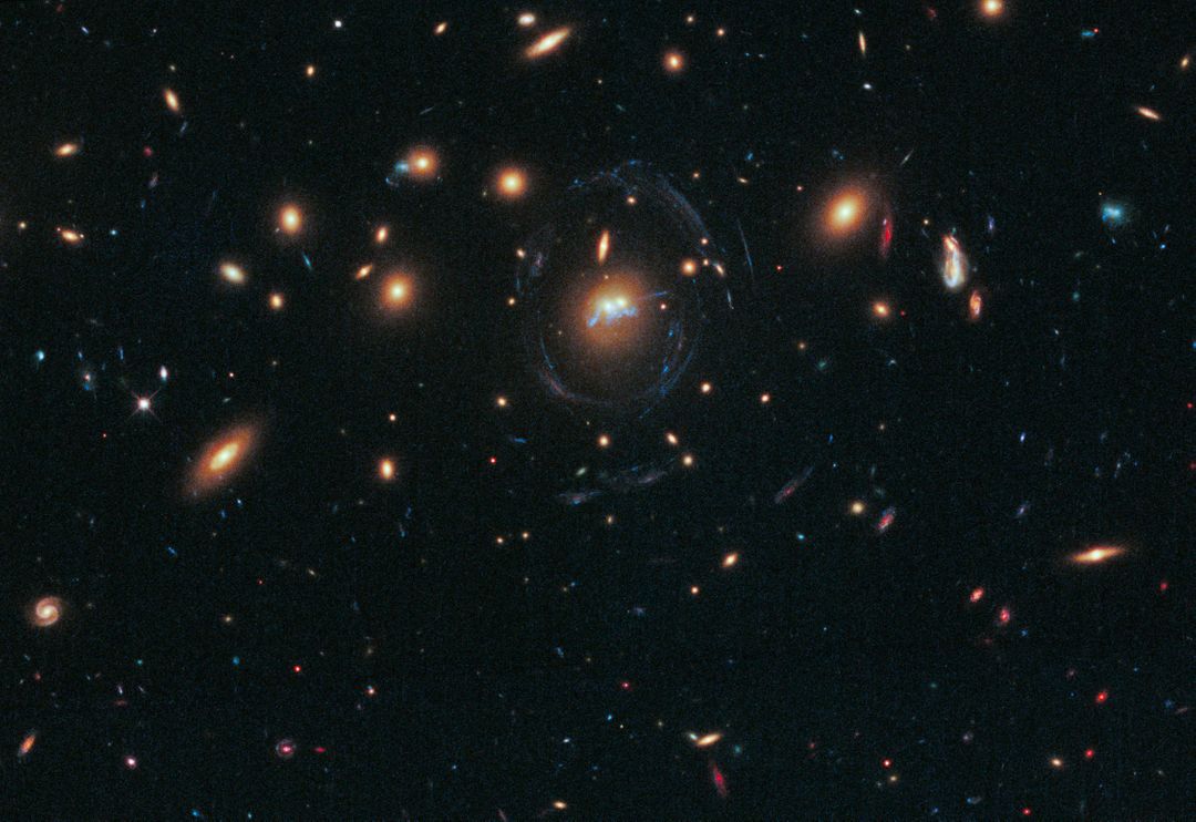 Hubble Sees Spiral Bridge of Young Stars Between Two Ancient Galaxies - Free Images, Stock Photos and Pictures on Pikwizard.com
