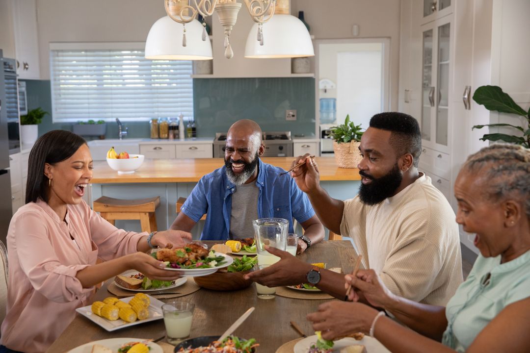 Multi-Generational Family Sharing Meal in Modern Kitchen
