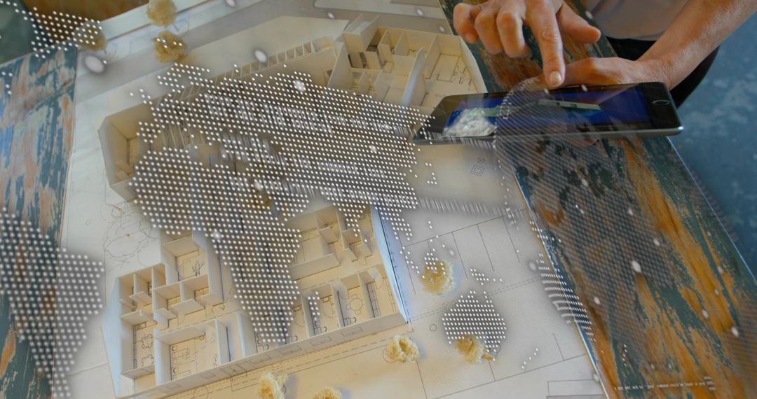 Showing Architectural Scale Model with Tablet Touch and Dotted World Map Overlay