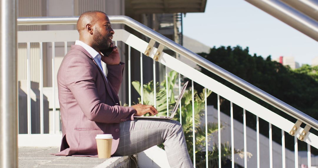 Business Professional Working Remotely on Urban Steps