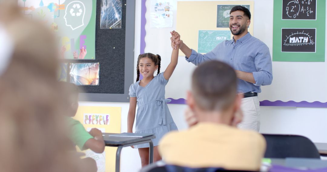 Teacher Celebrating Success with Engaged Diverse Student
