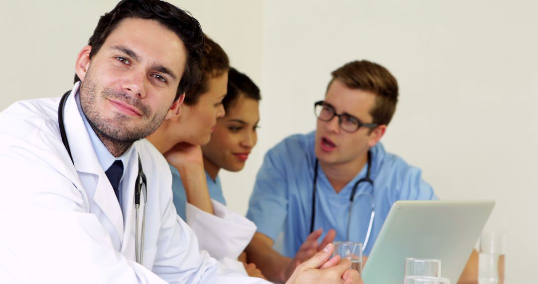 Medical Team Discussing Together in Modern Office - Free Images, Stock Photos and Pictures on Pikwizard.com