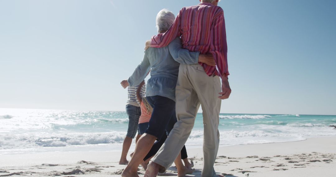 Senior Friends Enjoying a Walk on the Beach - Free Images, Stock Photos and Pictures on Pikwizard.com