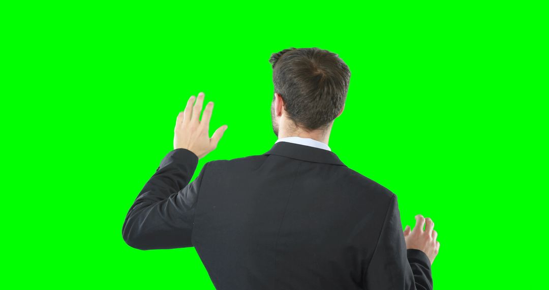 Businessman Back View Gesturing Video Conferencing Green Screen - Free Images, Stock Photos and Pictures on Pikwizard.com