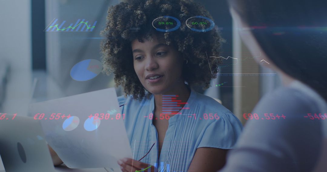 Diverse Businesswomen Discussing Data Analytics for Corporate Strategy