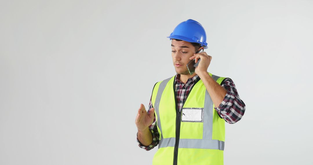 Construction Worker Using Smartphone for Communication - Free Images, Stock Photos and Pictures on Pikwizard.com