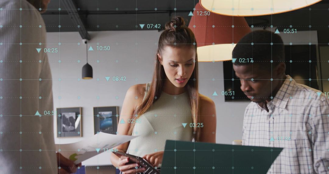 Diverse Team Collaborating in Modern Office with Digital Elements