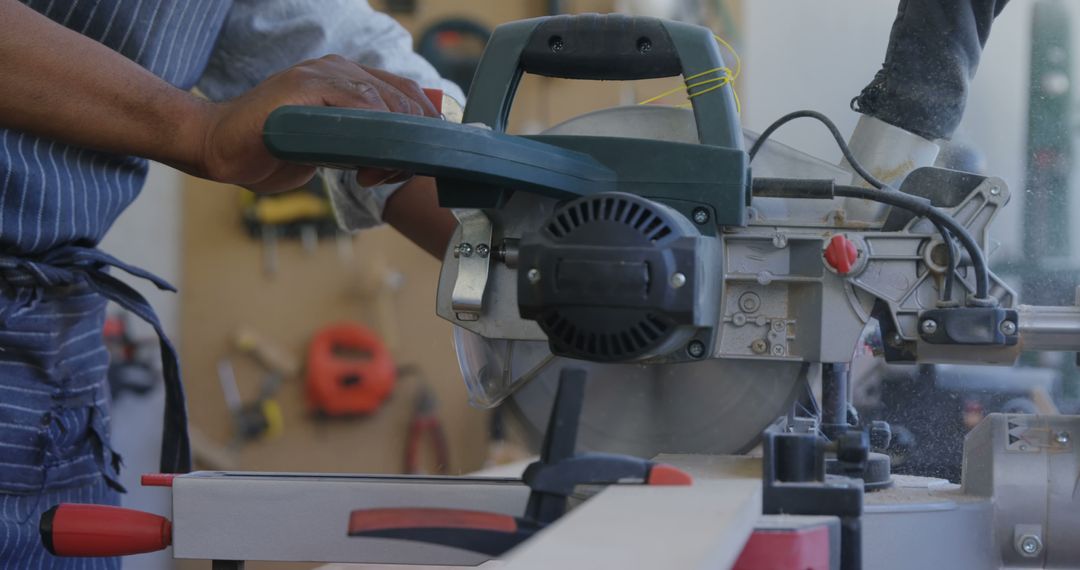 Carpenter Using Circular Saw in Workshop - Free Images, Stock Photos and Pictures on Pikwizard.com