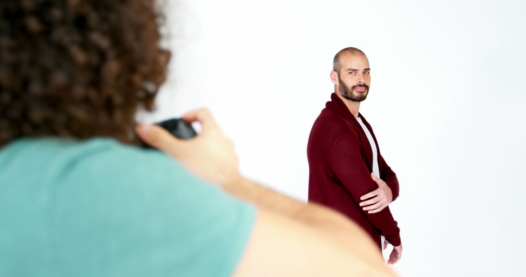 Photographer Capturing Professionals at Studio Portrait Session