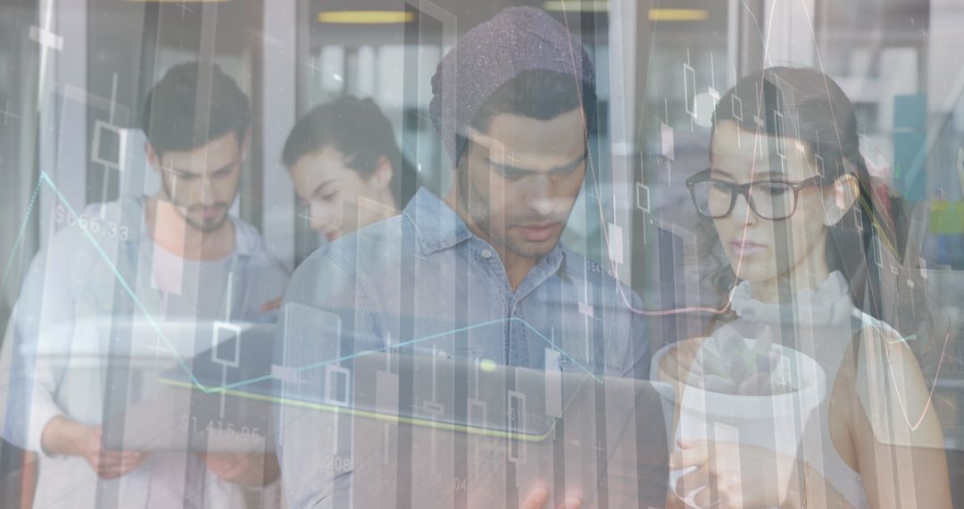 Diverse Team Collaborates on Financial Data in Modern Office