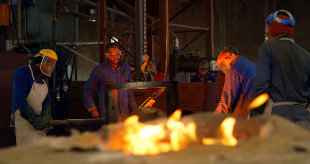 Industrial Workers Collaborating in Factory - Free Images, Stock Photos and Pictures on Pikwizard.com