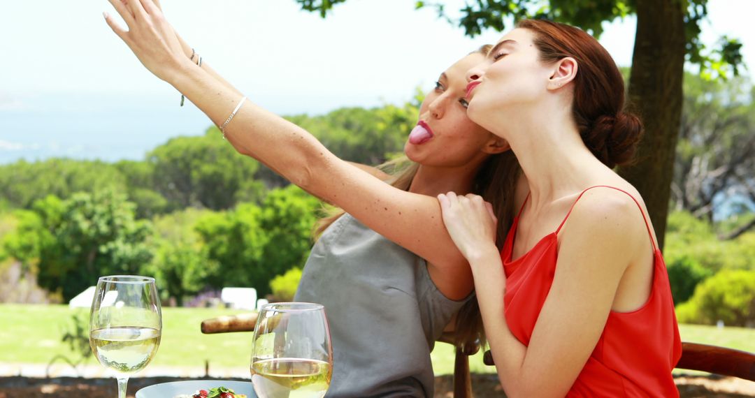 Friends Taking Selfie While Dining Outdoors on Sunny Day - Free Images, Stock Photos and Pictures on Pikwizard.com