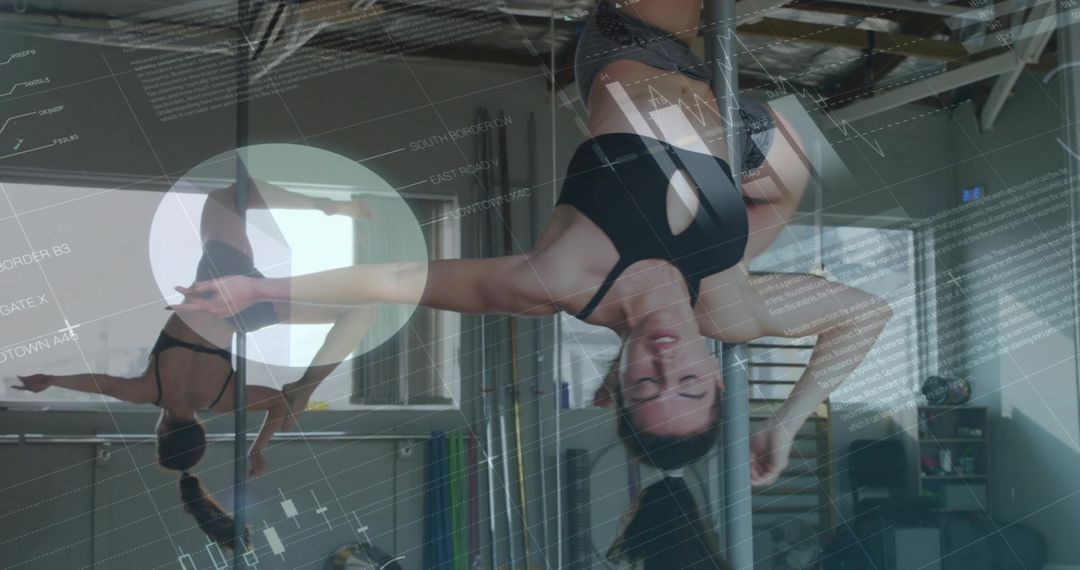 Graceful Pole Fitness Dancer in Modern Studio Showing Inverted Hold