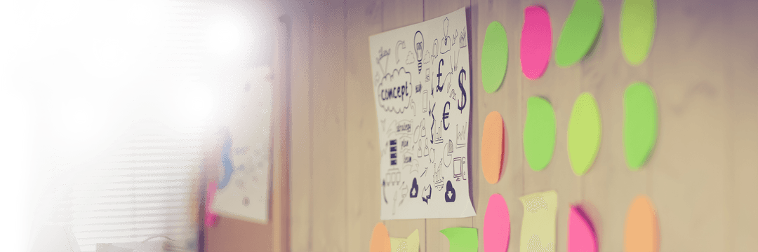 Transparency in Brainstorming: Adhesive Notes and Charts in Office Interior