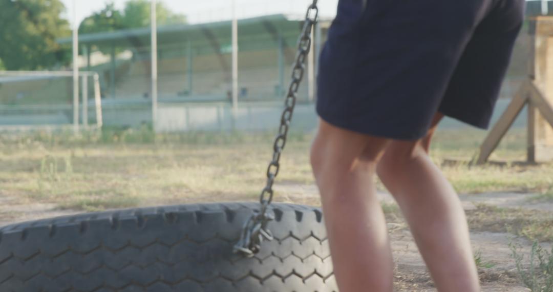 Young Athlete Pulling Tire in Outdoor Bootcamp Training - Free Images, Stock Photos and Pictures on Pikwizard.com