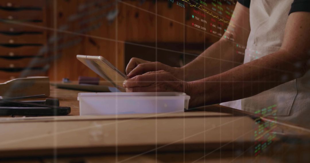 Craftsperson Using Tablet in Woodworking Studio