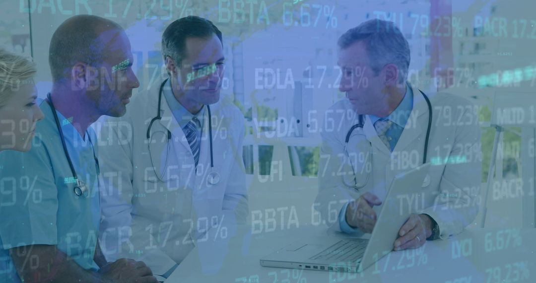 Doctors Analyzing Healthcare Data on Laptop