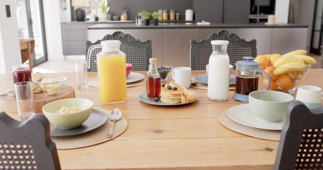 Modern Kitchen Table with Healthy Breakfast Items - Free Images, Stock Photos and Pictures on Pikwizard.com