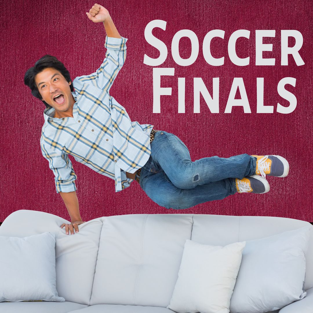 Excited Man Jumping on Sofa Celebrates Soccer Finals Victory
